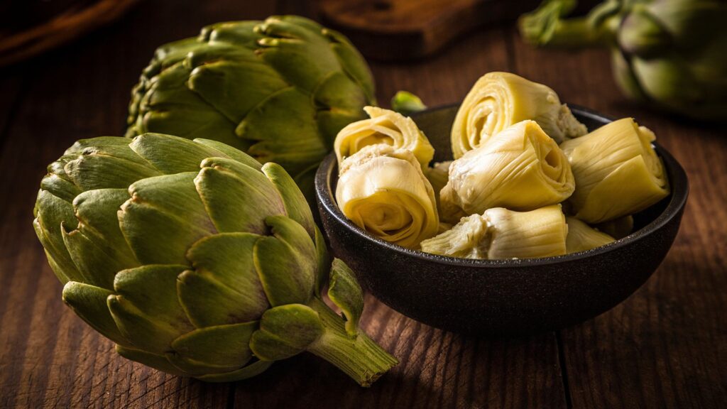 fresh artichokes in a bowl